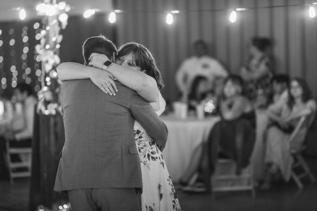 Mother of the Groom and groom dancing at a lds/mormon church wedding held in Hemet, California