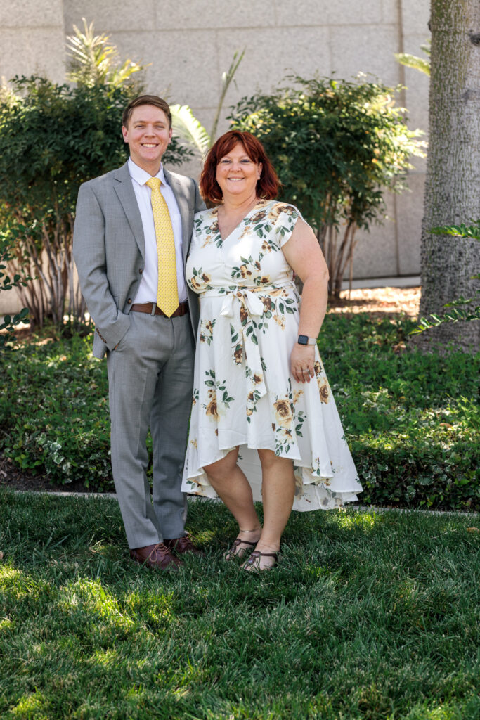 Mom and Groom pose outside the Redlands California LDS temple on their wedding day.